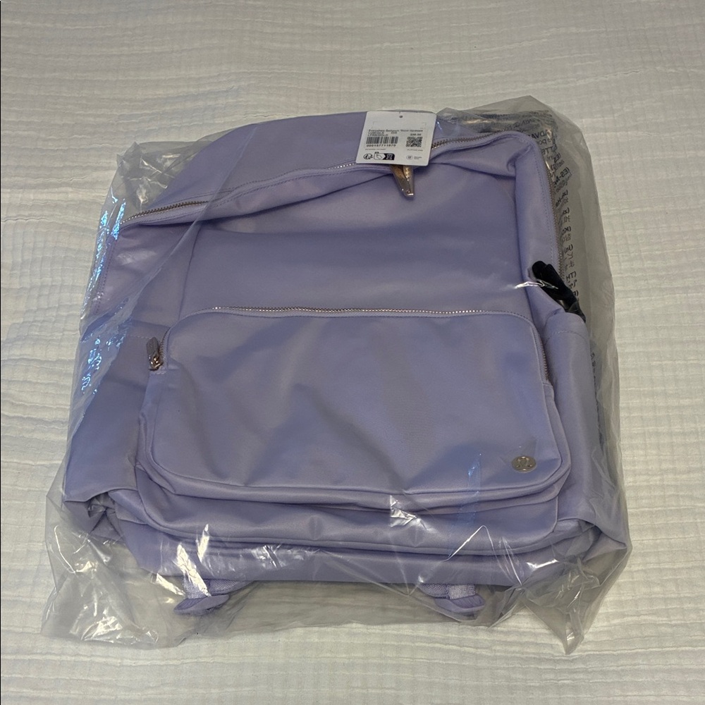 Lululemon Lavender Backpack with Gold Accents